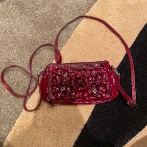 Red crossbody clutch bag